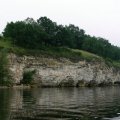 &nbsp;&nbsp;&nbsp;&nbsp;&nbsp;&nbsp;&nbsp;&nbsp; &nbsp;До финиша остается километров 5. Пора. Включаюсь,
увеличиваю темп,&nbsp; гребу и даже не
оглядываюсь, если будут обгонять, всё равно ведь увижу. Тем временем, вижу, как
финишируют ребята на Ладоге-2. Беречь силы нет смысла, ведь будет возможность
отдохнуть на финише 2 часа перед стартом 2-ого этапа.

&nbsp;&nbsp;&nbsp;&nbsp;&nbsp;&nbsp;&nbsp; &nbsp;Этот последний 122-ой километр я помню до сих
пор и помнить буду, ещё наверное, очень долго. Темп гребли был такой, что спины
и рук я просто не чувствовал, а каяк, он &nbsp;не плыл, он словно птица &nbsp;летел над водой! С
разгону чуть не вылетаю на берег, но лодку вовремя ловят. Главный судья гонки Юрий Капоткин,
останавливает свой секундомер - 7 часов 19 минут утра, 1-ый этап прошел за 12 часов 49
минут. В абсолюте ты - третий, молодец, поздравляю! Я вспоминаю Васю, спасибо тебе, Дзёма!&nbsp;Невозможно описать словами, то что я чувствую, пока это было самое трудное, что мне приходилось делать в своей жизни и мысленно и физически и эмоционально! И оно того стоило! &nbsp;Впервые я испытываю то, что наверное чувствовали те первые двое каякеров, которые прошли в одиночку кругосветку в 1998 и 2006 году, и сейчас я еще больше их уважаю!

&nbsp;&nbsp;&nbsp;&nbsp;&nbsp;&nbsp;&nbsp;&nbsp;&nbsp; Через 2
минуты финиширует "Мустанг". Его экипаж явно чем-то недоволен и по их косым
взглядам я понимаю, что на 2-ом этапе они порвут уже меня.

&nbsp;&nbsp;&nbsp;&nbsp;&nbsp;&nbsp; Не могу вылезти
из лодки,&nbsp; она не хочет меня выпускать, кажется
что я и каяк теперь одно целое. Скидываю спасжилет, свешиваю ноги за борт &nbsp;и отдыхаю.

